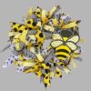bee deco mesh wreath with large wooden bee sign of yellow, black and white bee. yellow and black polka dot ribbon. little bees on white ribbon. yellow ribbon. black check ribbon. black striped ribbonblack and white deco mesh base.