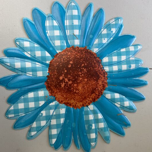 sunflower sign with turquoise gingham plaid petals and rust center sign