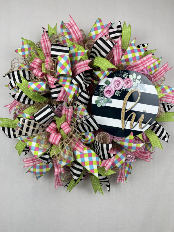 summer wreath with hi sign in black stripes and pink flowers, coordinating ribbons and bows