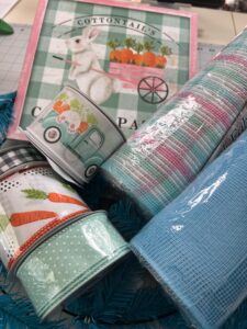 Easter wreath supply kit, bunny inside truck ribbon, carrot ribbon,swiss dot ribbon, black and white houndstooth plaid ribbon, cute bunny sign