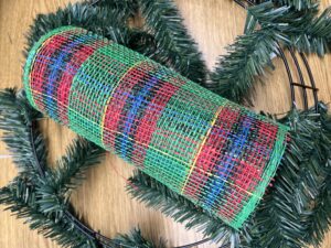 green tinsel tie wreath frame and christmas plaid deco mesh for a christmas wreath