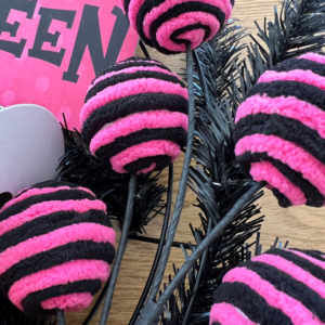 halloween wreath pick of pink and black striped chenille balls